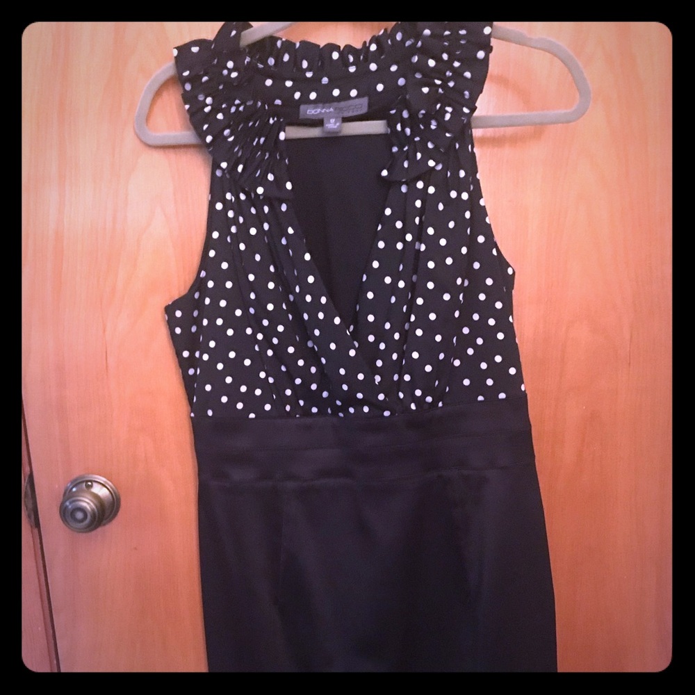 High neck, deep V, black dress